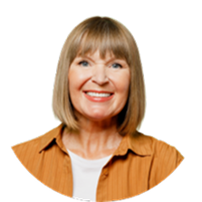 Woman with blonde hair smiling, wearing an orange shirt